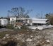 Debris from storm surge damage left by Hurricane Ian is seen in a mobile home park where Jimmy and Shirley Driggers lives on Pine Island, Florida on Saturday, October 27, 2022. (Octavio Jones for NPR)